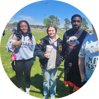 PACE student volunteers helping with the kite festival